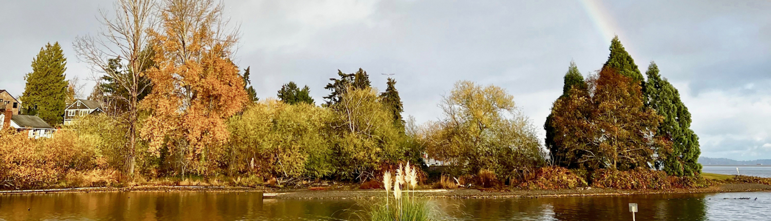 The Sanctuary in fall colors, with a rainbow. Photo Andrew Shroyer.