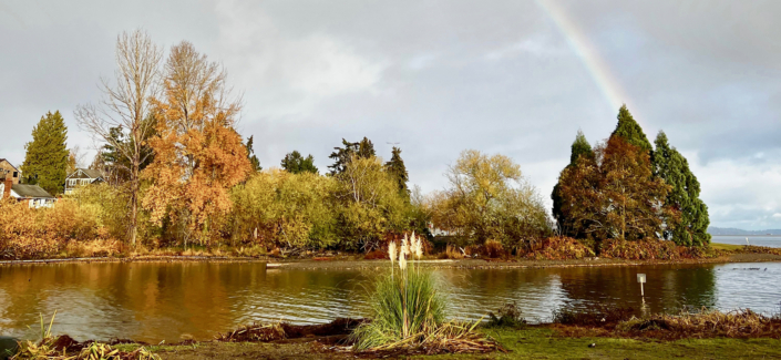 The Sanctuary in fall colors, with a rainbow. Photo Andrew Shroyer.